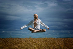 man-flying-freedom-yoga-meditation-64403354